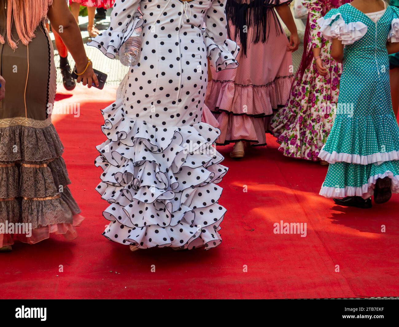 Flamenco dresses during the celebration of the Feria del Rosario in