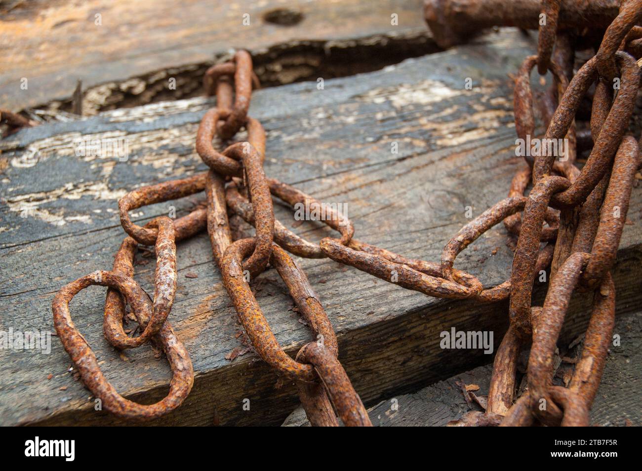 Rusted chains and weathered textures Stock Photo - Alamy