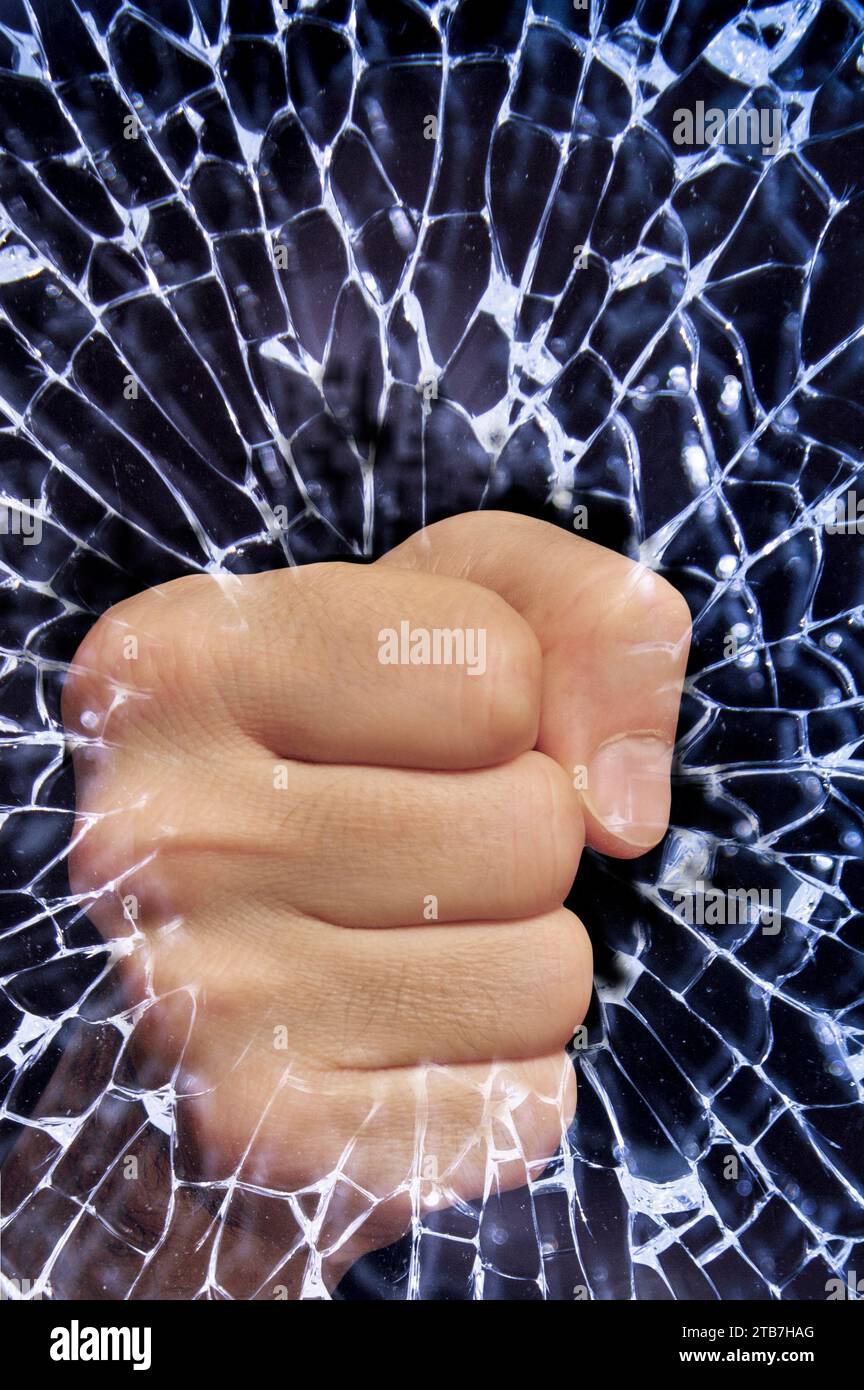 man fist breaking a glass Stock Photo Alamy