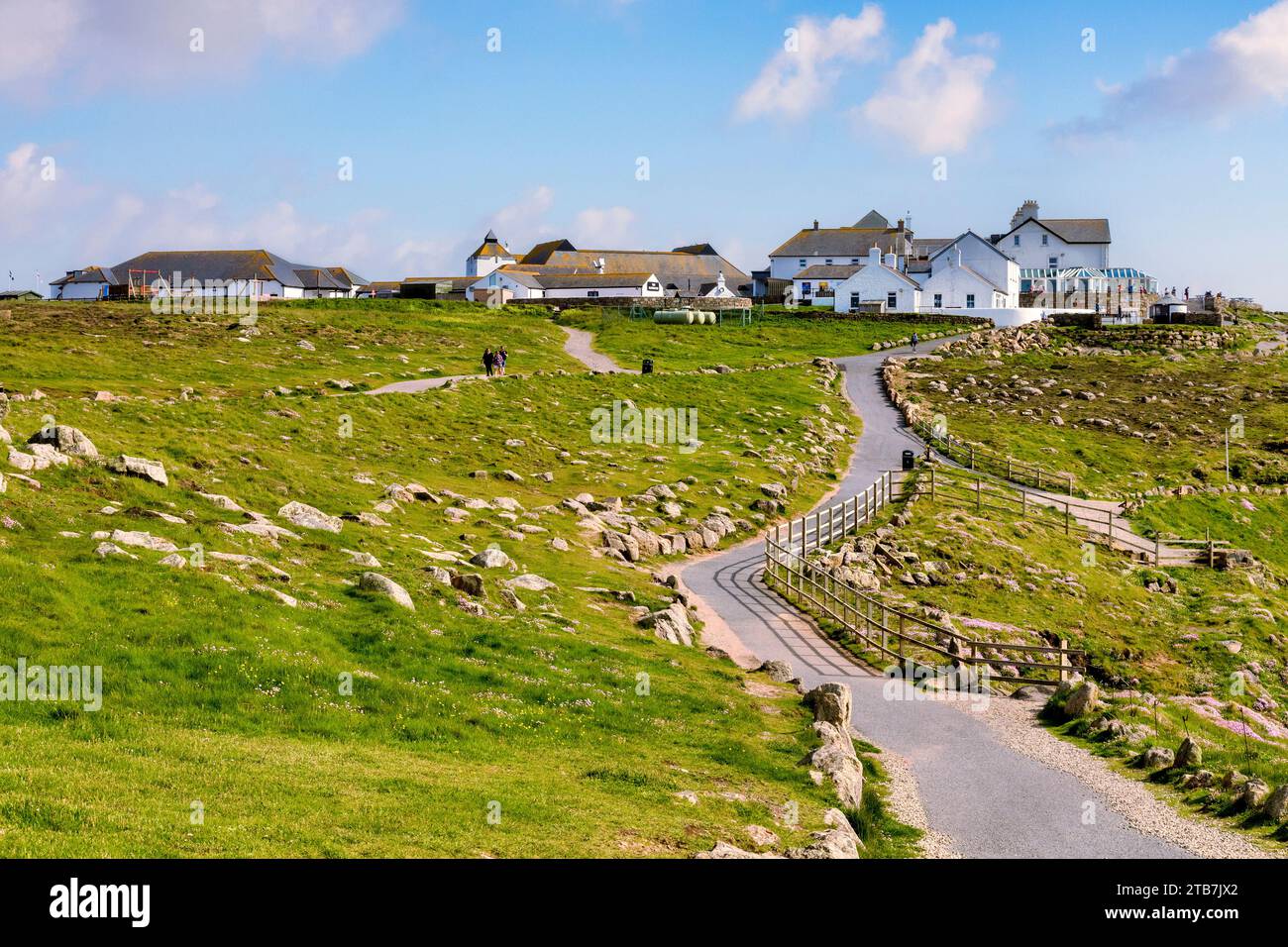 17 May 2023: Land's End, Cornwall, UK - The Land's End Landmark visitor attraction, and the path from Sennen Cove, part of the South West Coast Path. Stock Photo