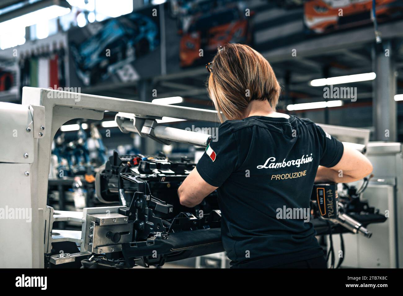 Italy, Sant’Agata Bolognese, 2018/04/13: Automobili Lamborghini’s plant. Women working in the workshop Stock Photo