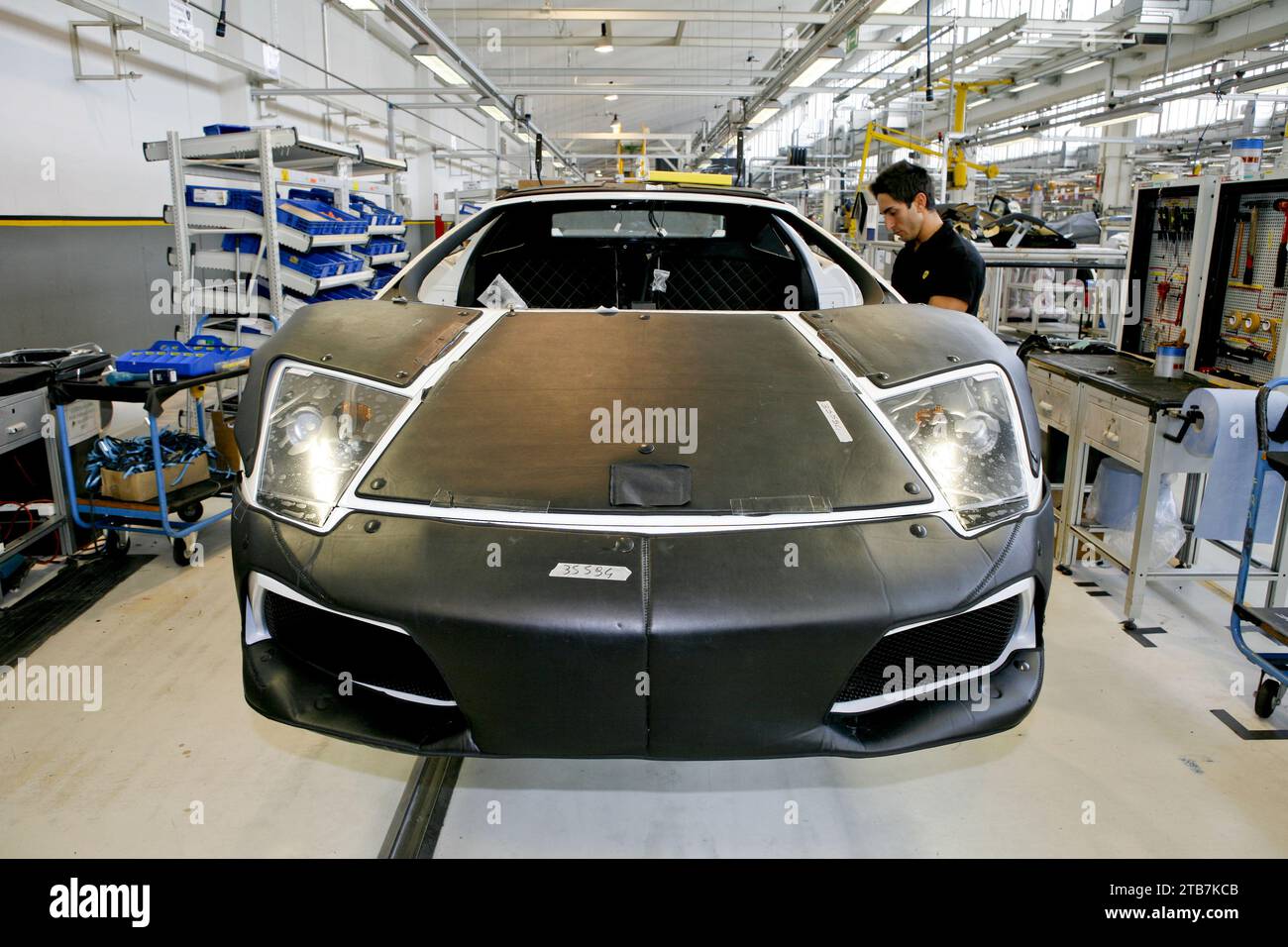 Italy, Sant'Agata Bolognese, Automobili Lamborghini’s factory, 2008/10/10: workers at work on the Murcielago LP640-4 assembly line, the brand's first Stock Photo