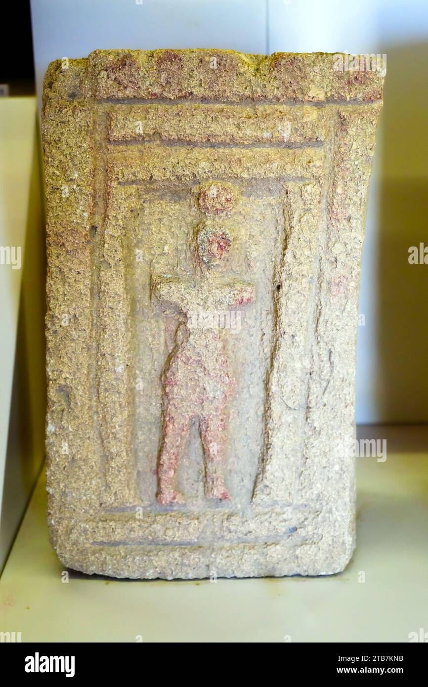 Stele with dancing man, second half 6th - first half 5th century BC. Traces of red paint - Baglio Anselmi archaeological museum - Marsala, Sicily, Italy Stock Photo