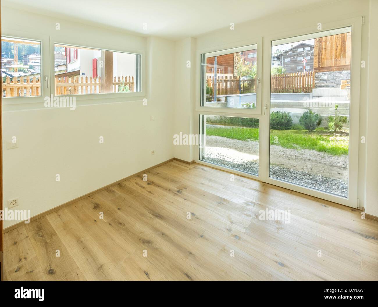 Image result for An empty, sunlit room showcasing large windows with a view ...