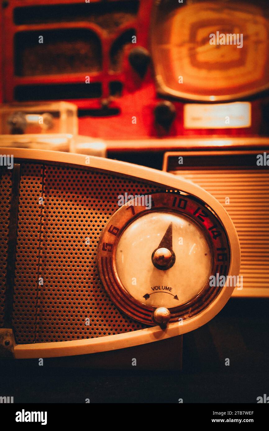 An antiquelooking radio in yellow illumination Stock Photo Alamy