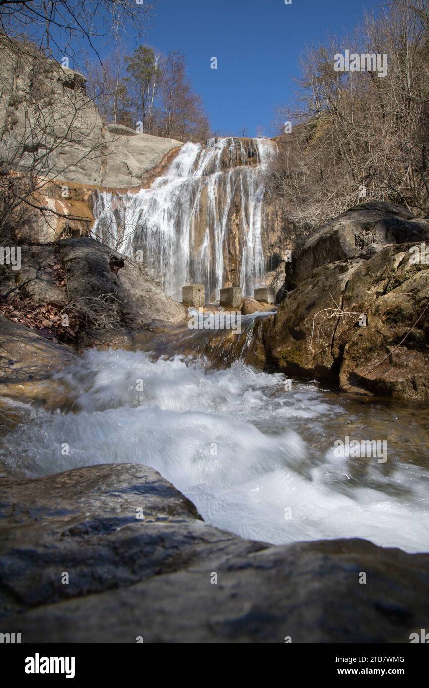 an-aerial-view-of-a-large-cliff-side-featuring-rocky-formations-and