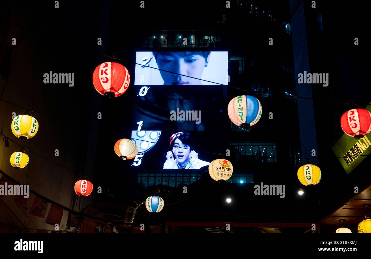 BTS Jin's birthday, Dec 4, 2023 : A birthday advertisement arranged by BTS member Jin's fans to celebrate his birthday is seen on a LED board of a department store building in central Seoul, South Korea. Jin turned 31 on Dec 4. Jin (Kim Seok-Jin) began his military service in December last year. He is now serving as a drill instructor at an Army boot camp. All able-bodied men are required to serve in the military for 18 months in South Korea which is technically still at war with North Korea as the 1950-53 Korean War ended with a truce, not a peace treaty. (Photo by Lee Jae-Won/AFLO) Stock Photo