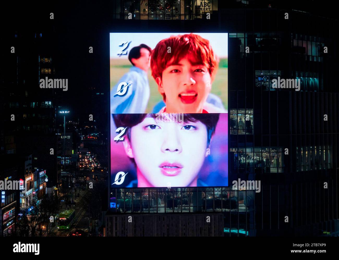 BTS Jin's birthday, Dec 4, 2023 : A birthday advertisement arranged by BTS member Jin's fans to celebrate his birthday is seen on a LED board of a department store building in central Seoul, South Korea. Jin turned 31 on Dec 4. Jin (Kim Seok-Jin) began his military service in December last year. He is now serving as a drill instructor at an Army boot camp. All able-bodied men are required to serve in the military for 18 months in South Korea which is technically still at war with North Korea as the 1950-53 Korean War ended with a truce, not a peace treaty. (Photo by Lee Jae-Won/AFLO) Stock Photo