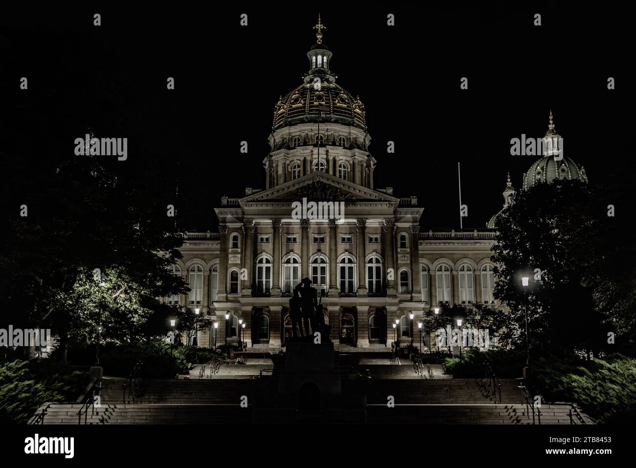An illuminated Iowa State Capitol Building, in Des Moines, Iowa, at night Stock Photo