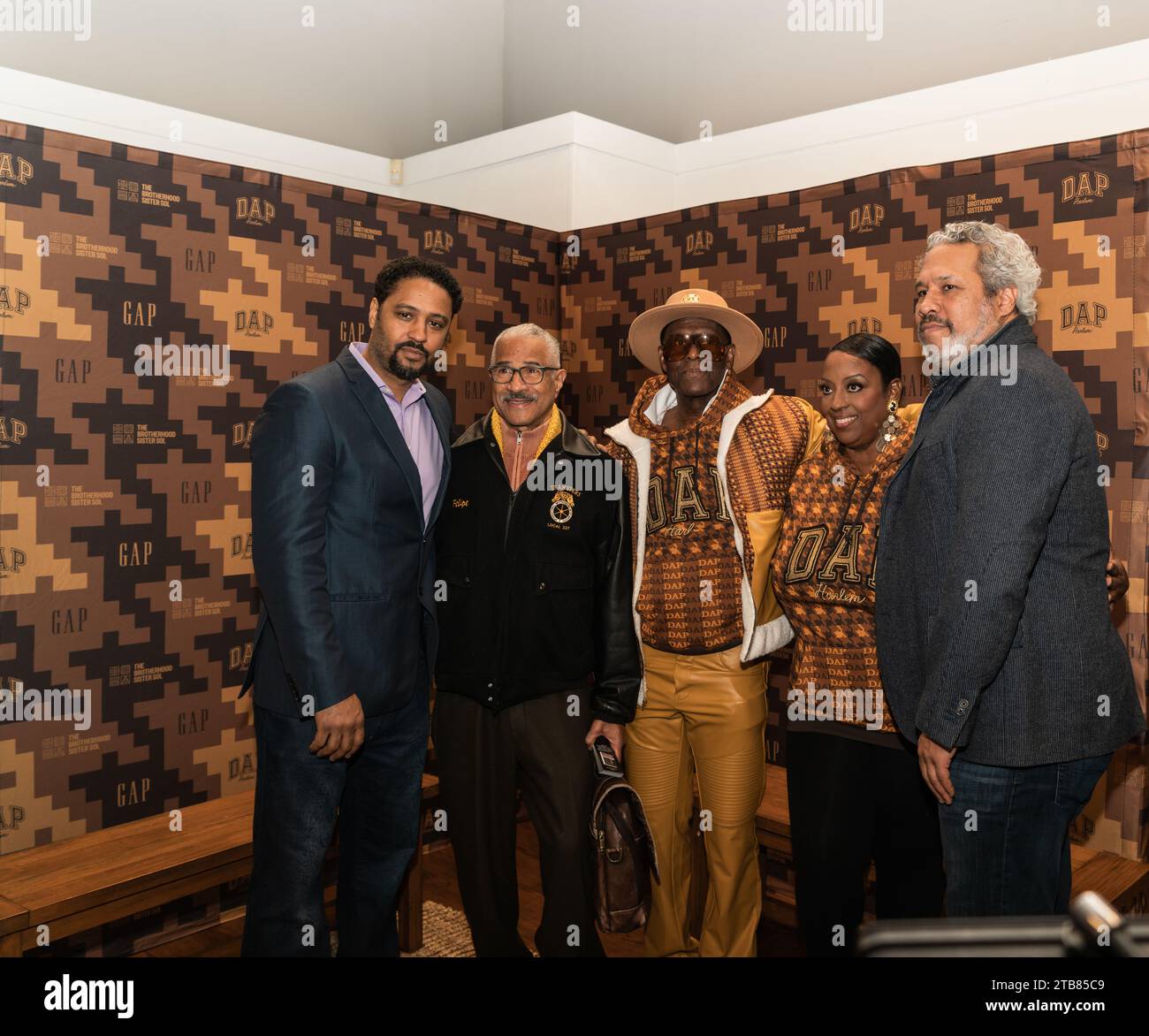 New York City, USA. 04th Dec, 2023. Legendary designer Dapper Dan debuts his new collection at the GAP in Harlem New York City, NY December 4, 2023. The founders of The Brotherhood Sister Sol Jason Warwin and Khary Lazarre-White, The CEO of the GAP Brand Mark Breitbard and Felipe Luciano also joined Dapper Dan in Harlem the neighborhood that inspires him the most. (Photo by Steve Sanchez/Sipa USA). Credit: Sipa USA/Alamy Live News Stock Photo