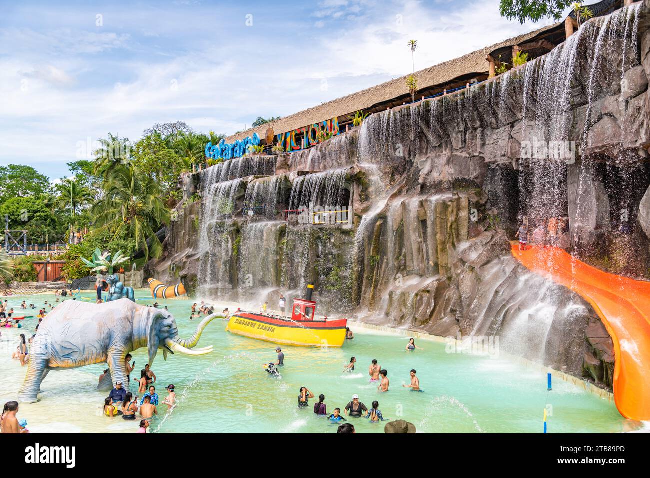 People at the water park at Hacienda Napoles in Colombia Stock Photo