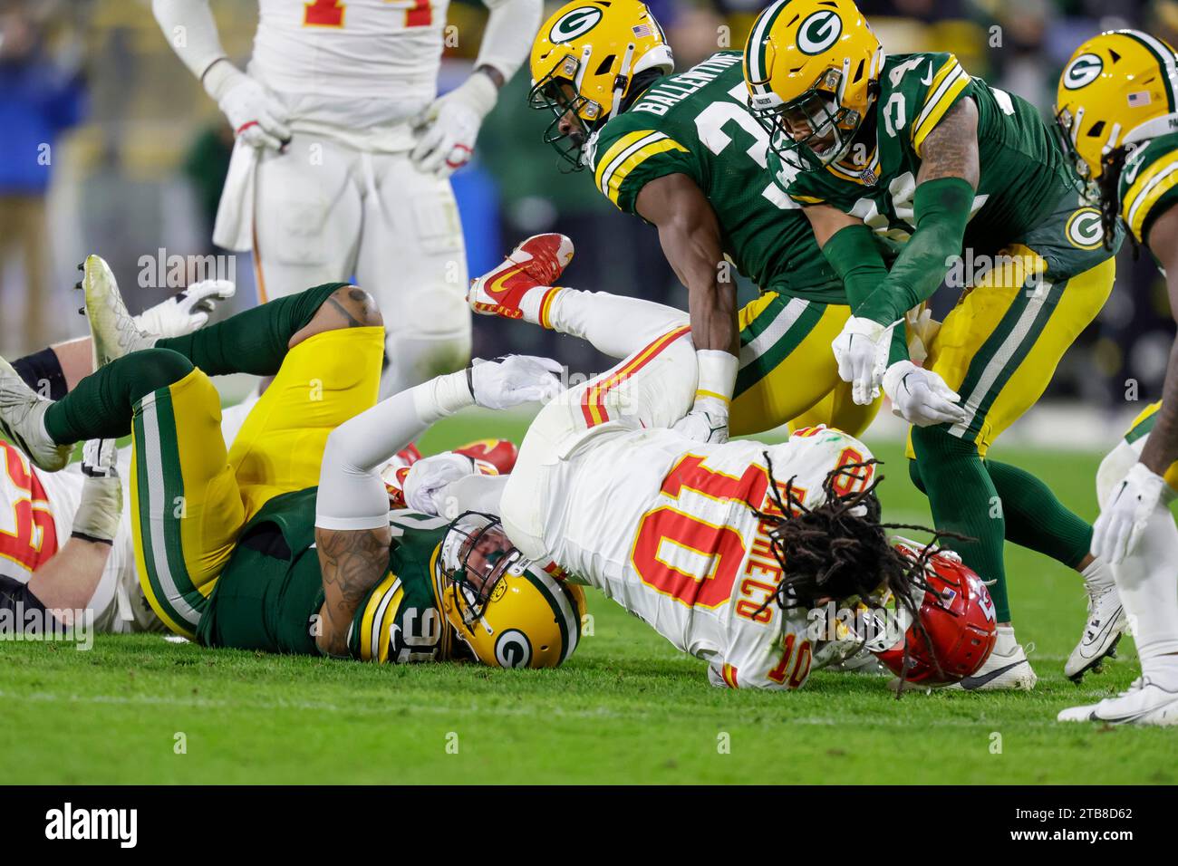 Kansas City Chiefs running back Isiah Pacheco (10) has his helmet knocked off after being hit by Green Bay Packers linebacker Preston Smith (91) during an NFL football game between the Green Kansas City Chiefs running back Isiah Pacheco (10) has his helmet knocked off after being hit by Green Bay Packers linebacker Preston Smith (91) during an NFL football game between the Green