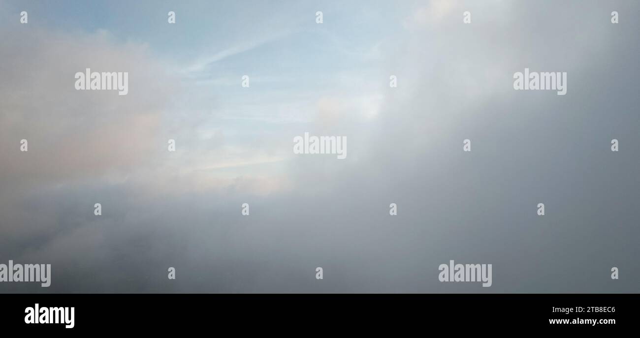 Fluffy soft clouds close up view on sky background Stock Photo