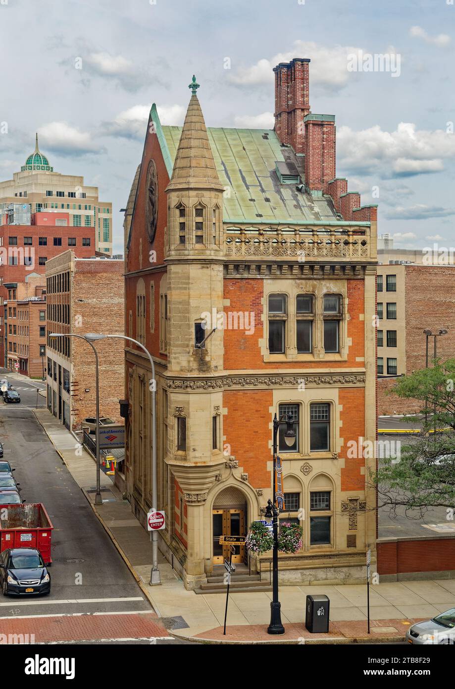 Stone-trimmed red brick Mechanics and Farmers Bank, long vacant, is prominent along lower State Street despite its small height and footprint. Stock Photo