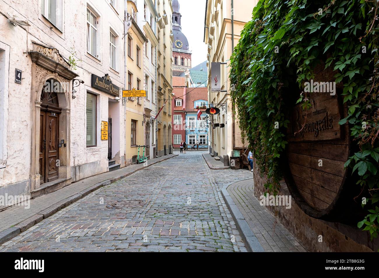 Beautiful cobblestone street in old part of Riga city, Latvia Stock Photo