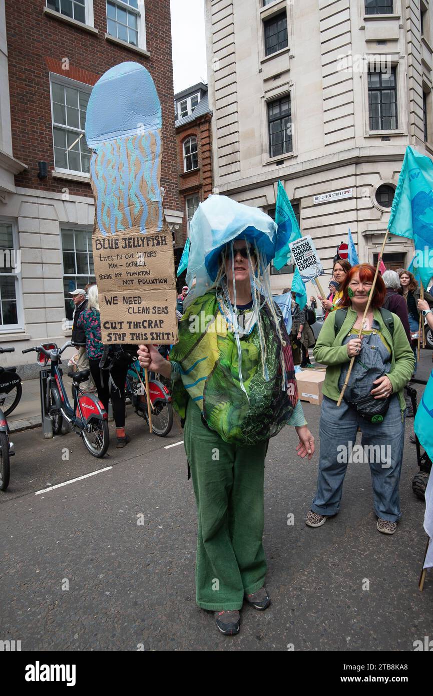 Westminster, London, UK. 22nd April, 2023. Thousands of Extinction Rebellion Rebels were in Westminster, London today on the second day of the  Big One, Unite to Survive action. There was a huge Earth Day Biodiversity march through the streets of Westminster. XR are calling on the Government to take action on climate crisis and for there to be no new fossil fuels. Credit: Maureen McLean/Alamy Stock Photo
