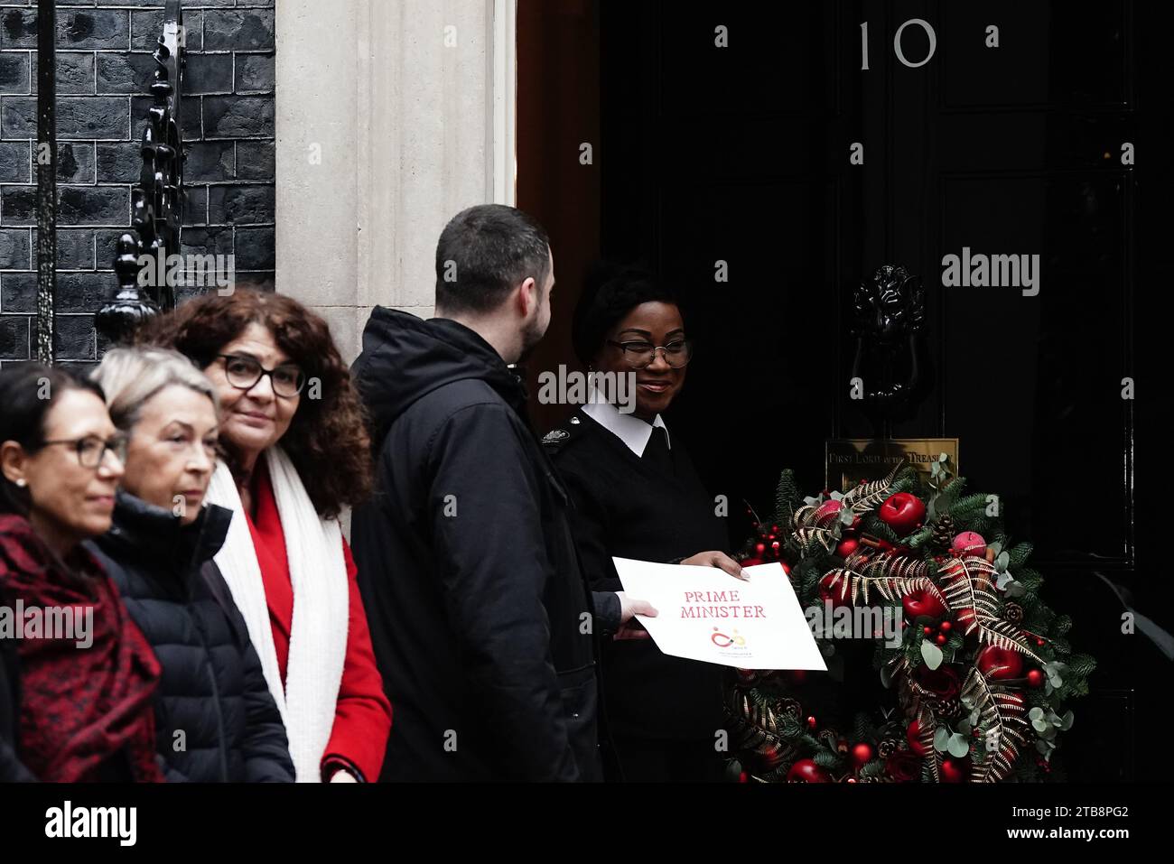 Jason Evans hands in a letter to Number 10 Downing Street, central