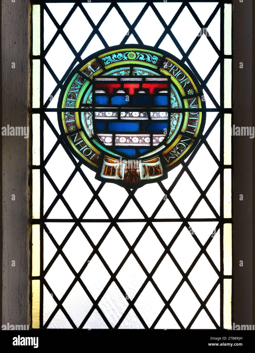 A partial stainedglass window, of John Farewell, Prior of Nottingham