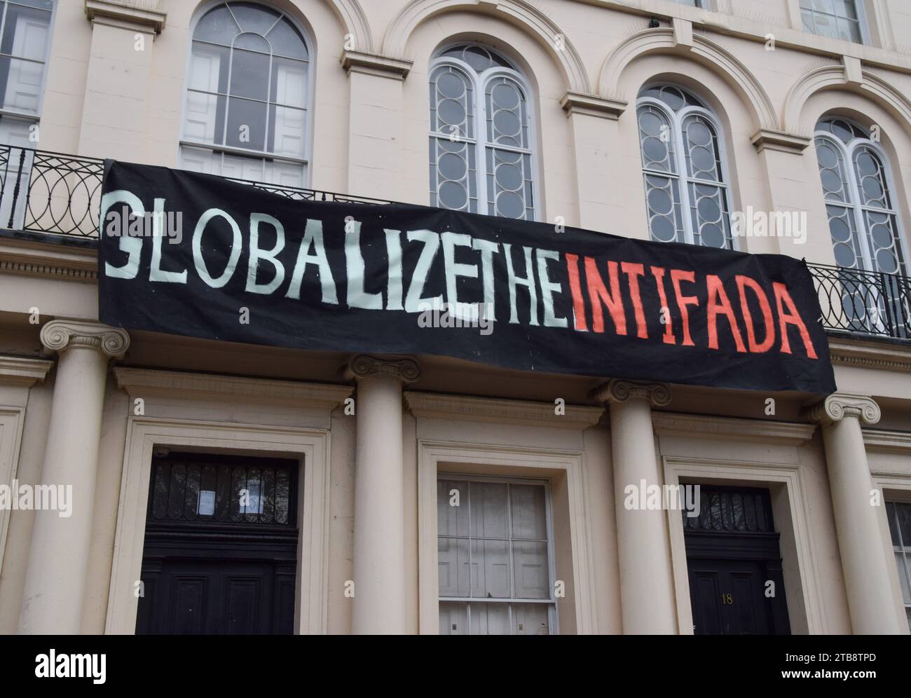 London, UK. 5th December 2023. Pro-Palestine squatters hang a banner stating 'Globalize the Intifada' outside the Diorama building next to Regent’s Park. Credit: Vuk Valcic/Alamy Live News Stock Photo