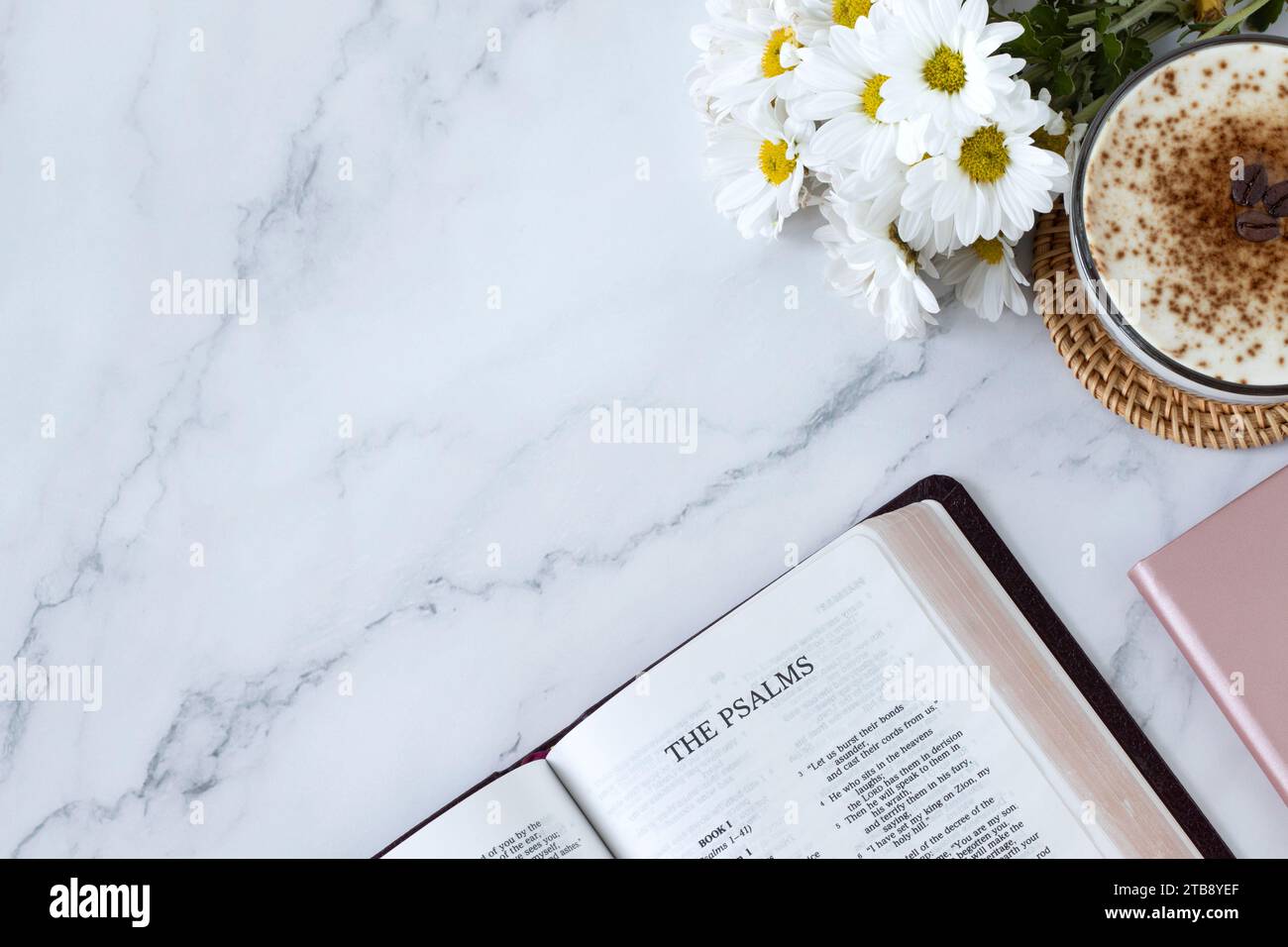 Psalms Open Holy Bible Book On White Marble Background With Coffee Cup And Flowers Top View