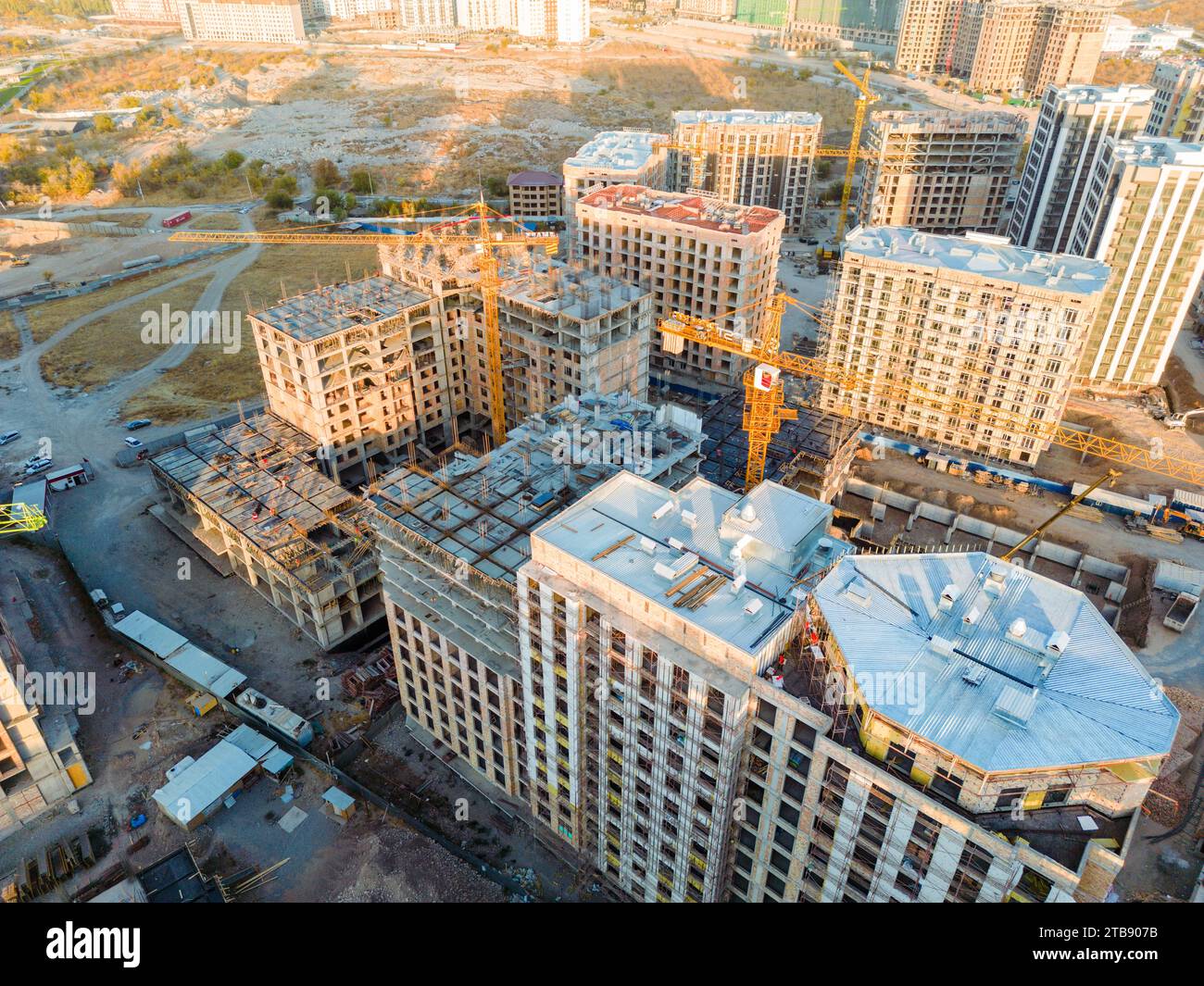 Aerial view of construction site of new residential buildings with ...