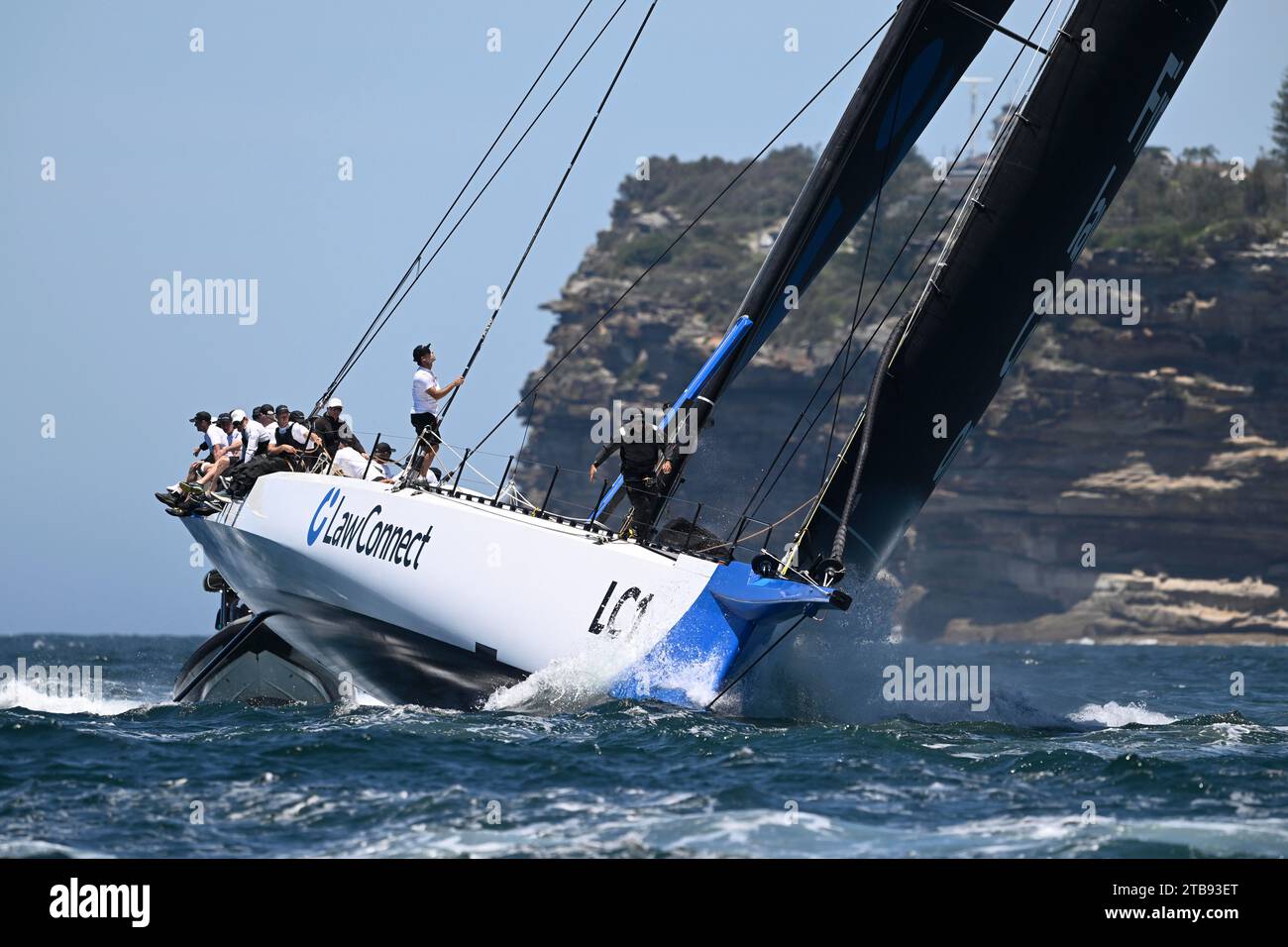 Sydney Harbour, Sydney, Australia. 5th Dec, 2023. 2023 Solas Big Boat Challenge; maxi yacht LawConnect skippered by Christian Beck sails down the harbour during the Solas Big Boat challenge Credit: Action Plus Sports/Alamy Live News Stock Photo