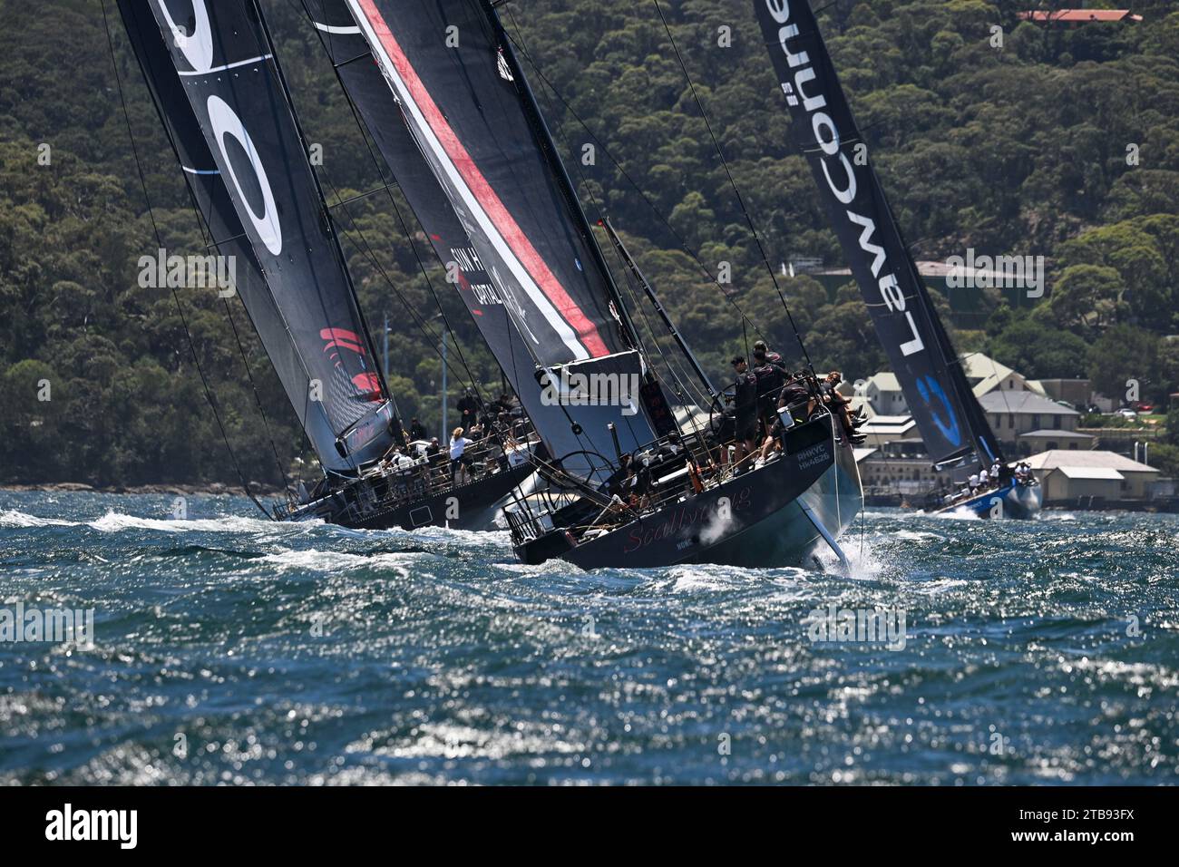 Sydney Harbour, Sydney, Australia. 5th Dec, 2023. 2023 Solas Big Boat Challenge; maxi yacht LawConnect skippered by Christian Beck leads Andoo Comanche skippered by John Winning Jr and SHK Scallywag skippered by David Witt during the Solas Big Boat challenge Credit: Action Plus Sports/Alamy Live News Stock Photo