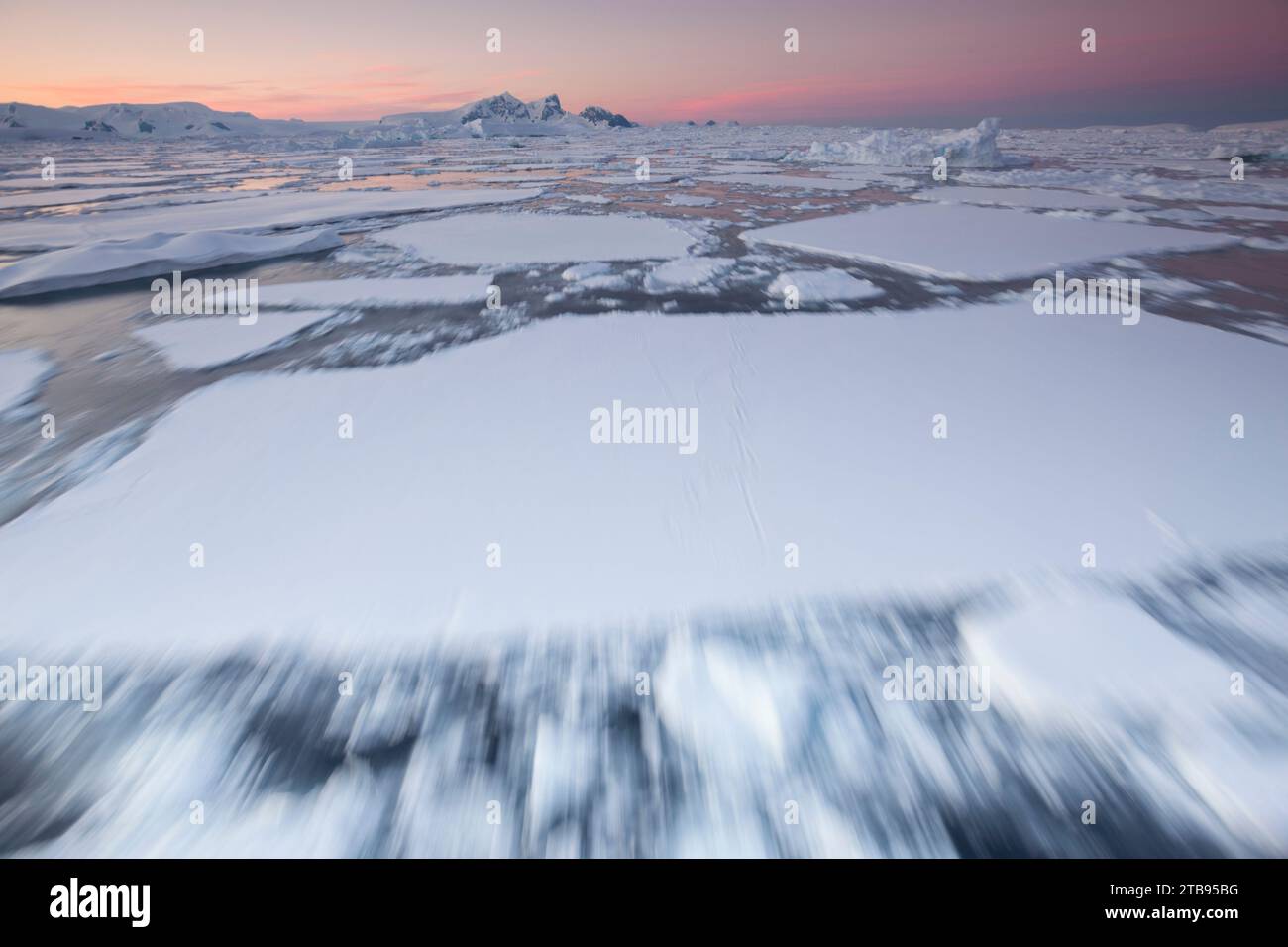 Broken ice viewed from a moving ship in Crystal Sound using a slow shutter speed; Penola Strait, Antarctica Stock Photo