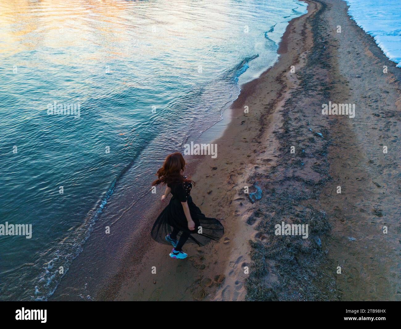 Black woman on a beach hi-res stock photography and images - Alamy
