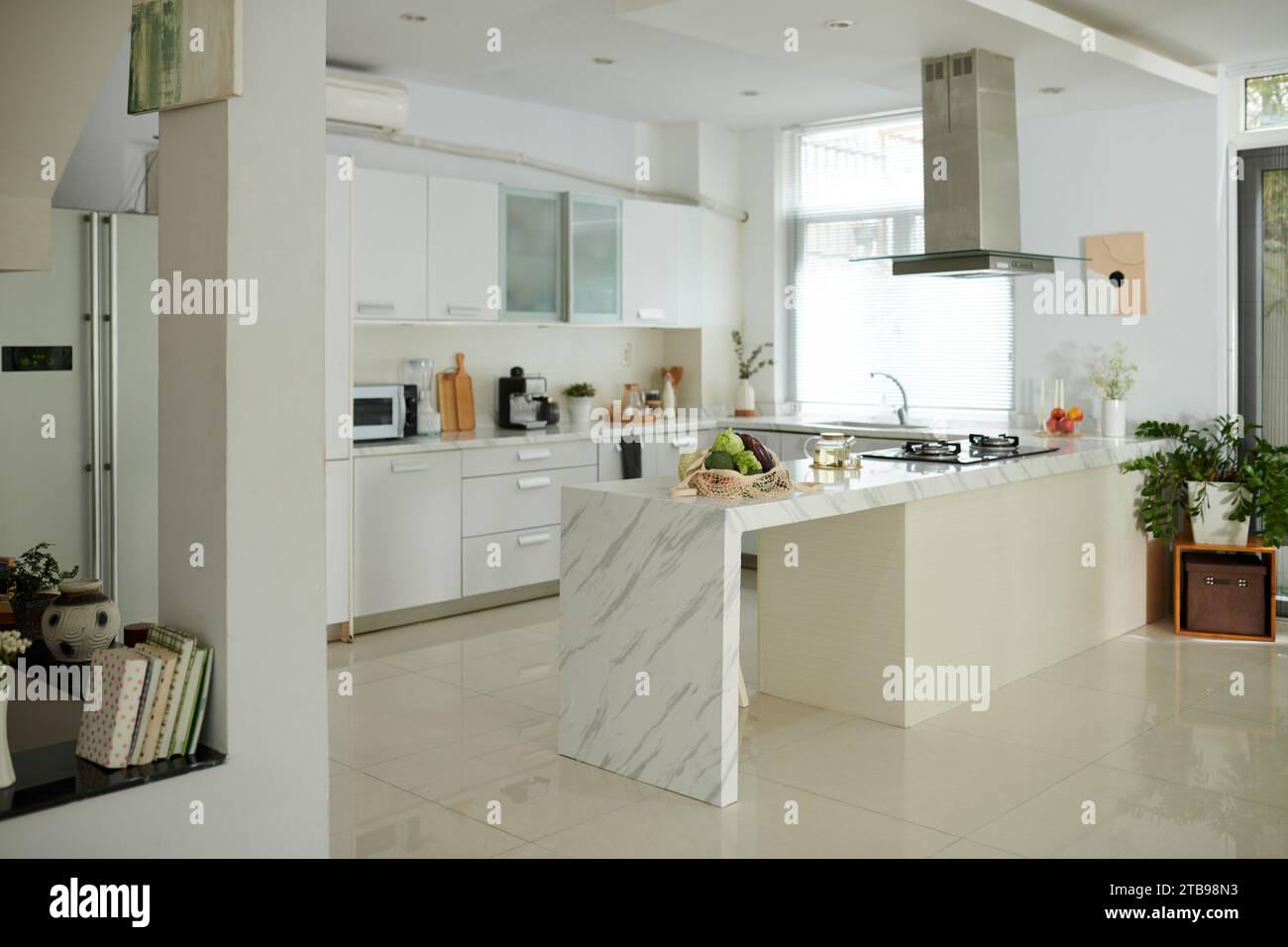 Interior design of spacious kitchen area in house Stock Photo - Alamy