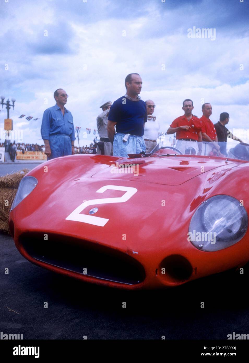 HAVANA, CUBA - FEBRUARY 24:  Juan Manuel Fangio (1911-1995) driver of the Maserati 300S stands next to his car before the start of the 1957 Cuban Grand Prix on February 24, 1957 in Havana, Cuba.  Fangio would win the race. (Photo by Hy Peskin) *** Local Caption *** Juan Manuel Fangio Stock Photo