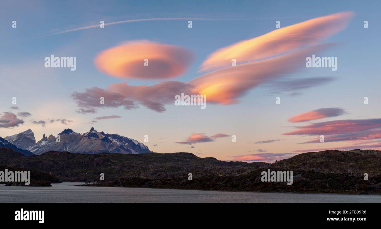 Sunrise from Lago Grey with lenticular clouds in Torres del Paine National Park; Patagonia, Chile Stock Photo