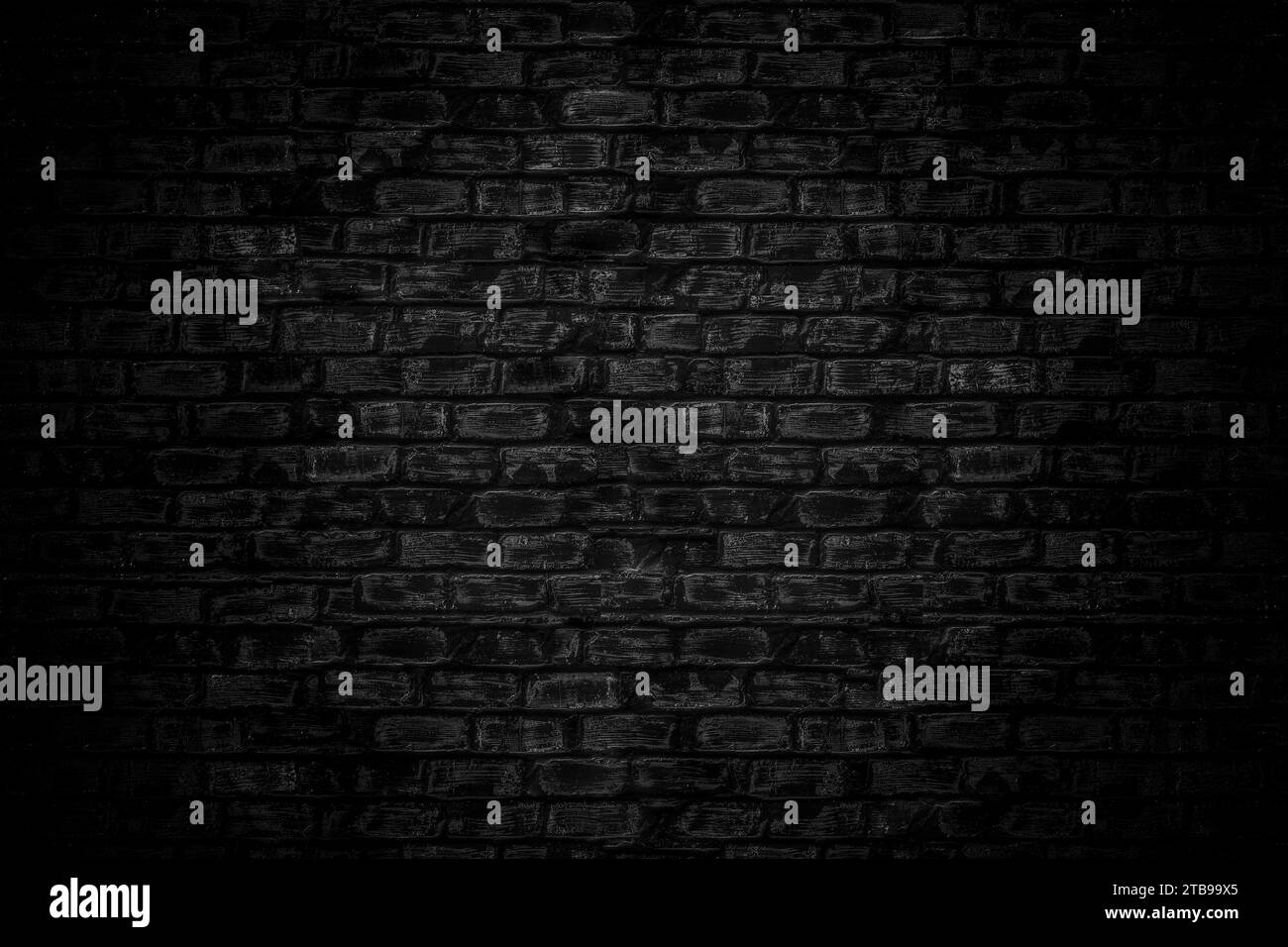 Black bricks wall background. Black old brick wall texture Stock Photo