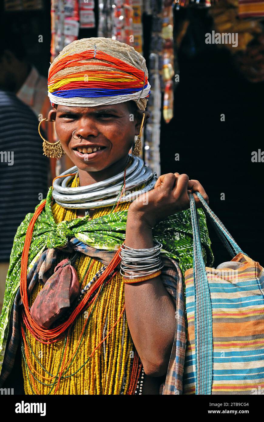 Bondas tribal women going to the Ankudeli market. The Bonda, also known as Remo, are a Munda ethnic group who live in the isolated hill regions of the Malkangiri district of southwestern Odisha, near the junction of the three states of Odisha, Chhattisgarh, and Andhra Pradesh. The tribe is one of the oldest and most primitive in mainland India; their culture has changed little for more than a thousand years. They are one of the 75 Primitive Tribal Groups identified by the Government of India. Stock Photo