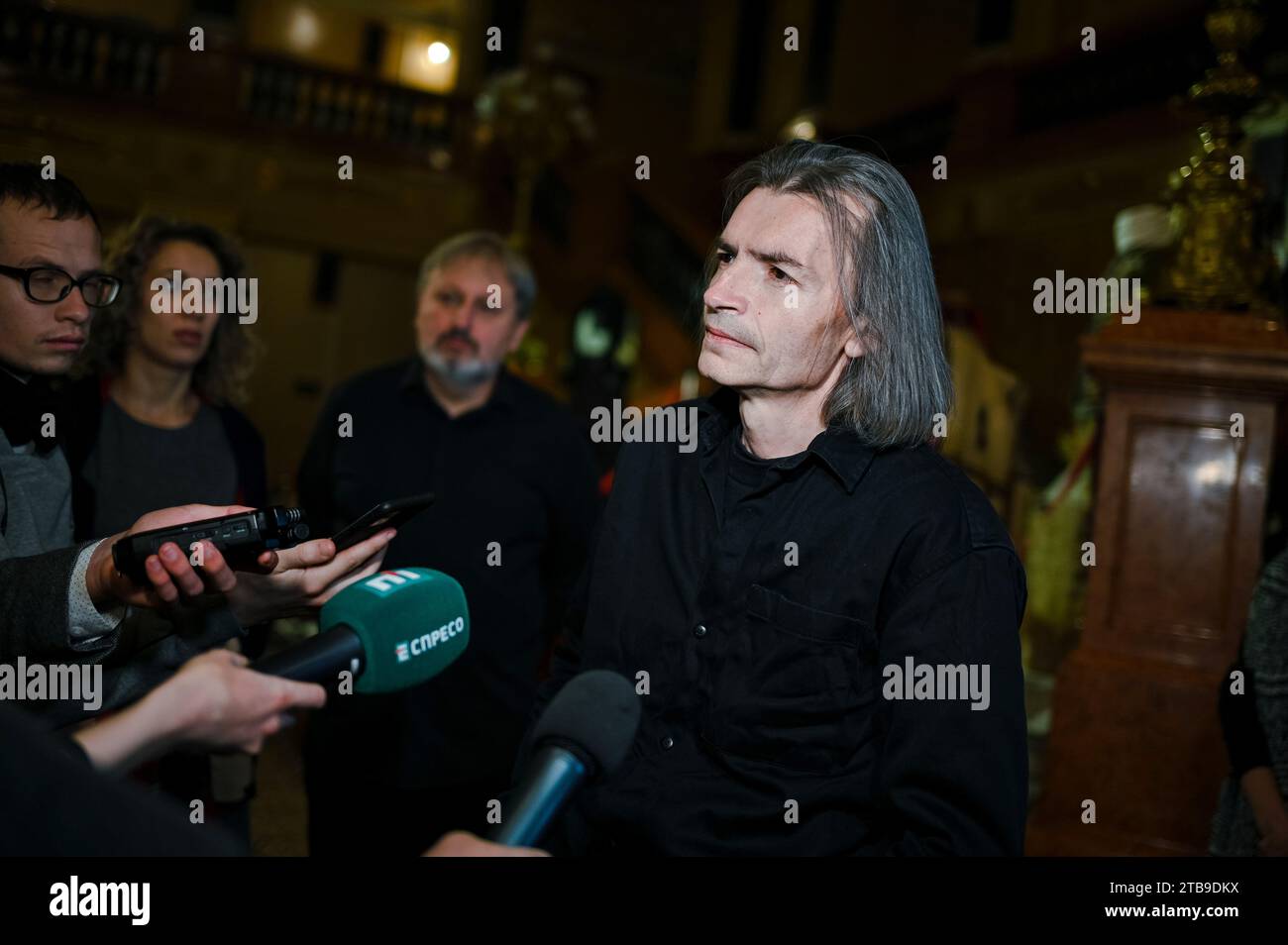 In Lviv, Ukraine, on December 1, 2023, composer Ivan Nebesnyi is being photographed during a briefing about the premiere of the ''Shadows of Forgotten Ancestors'' ballet at the Solomiya Krushelnytska Lviv National Academic Opera and Ballet Theatre. The ballet, which is based on the 1911 novel by Ukrainian writer Mykhailo Kotsiubynskyi, tells the tragic love story of Ivan and Marichka, two Hutsuls from rival families. Artem Shoshyn is staging the ballet, featuring music by Ivan Nebesnyi and a libretto by Vasyl Vovkun. (Photo by Ukrinform/NurPhoto) Stock Photo
