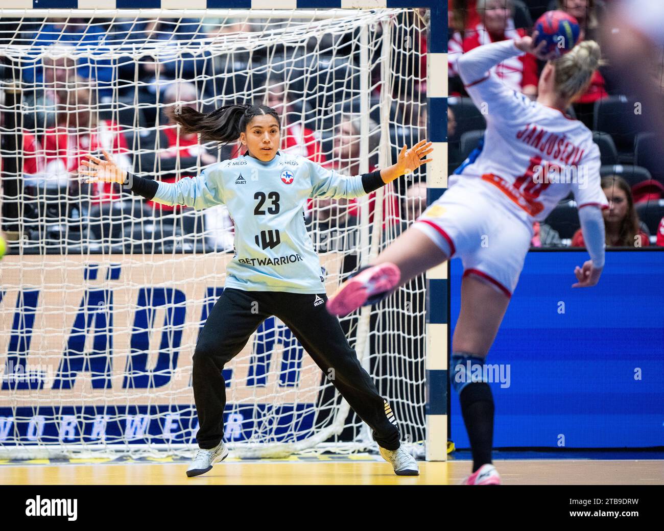 Goalkeeper Madeleine Noelia Cortez Fuenzalida of Chile in action with Andela Janjusevic of Serbia during the IHF World Women's Handball Championship match between Serbia and Chile in the preliminary group E in Jyske Bank Boxen in Herning in Denmark on Tuesday, December 5, 2023.. (Foto: Bo Amstrup/Ritzau Scanpix) Stock Photo
