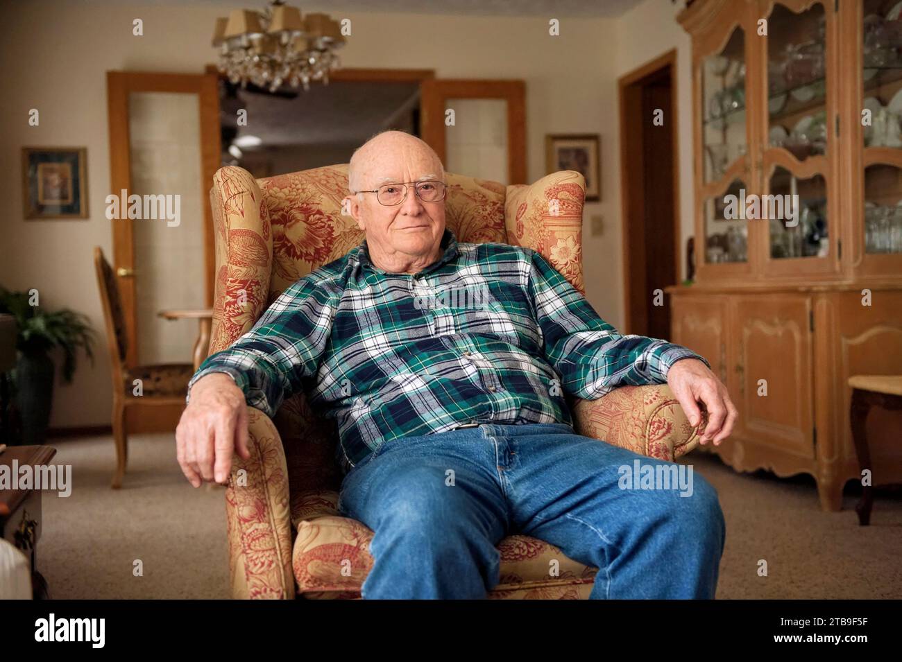 Portrait of a senior man relaxing in his home; Elkhorn, Nebraska, United States of America Stock Photo