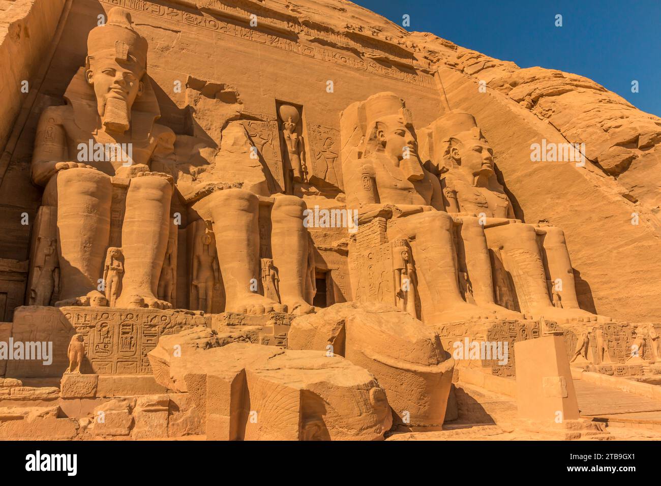 The four colossi of Ramesses II at the entrance of the the Temple of Ramesses II at Abu Simbel; Abu Simbel, Nubia, Egypt Stock Photo
