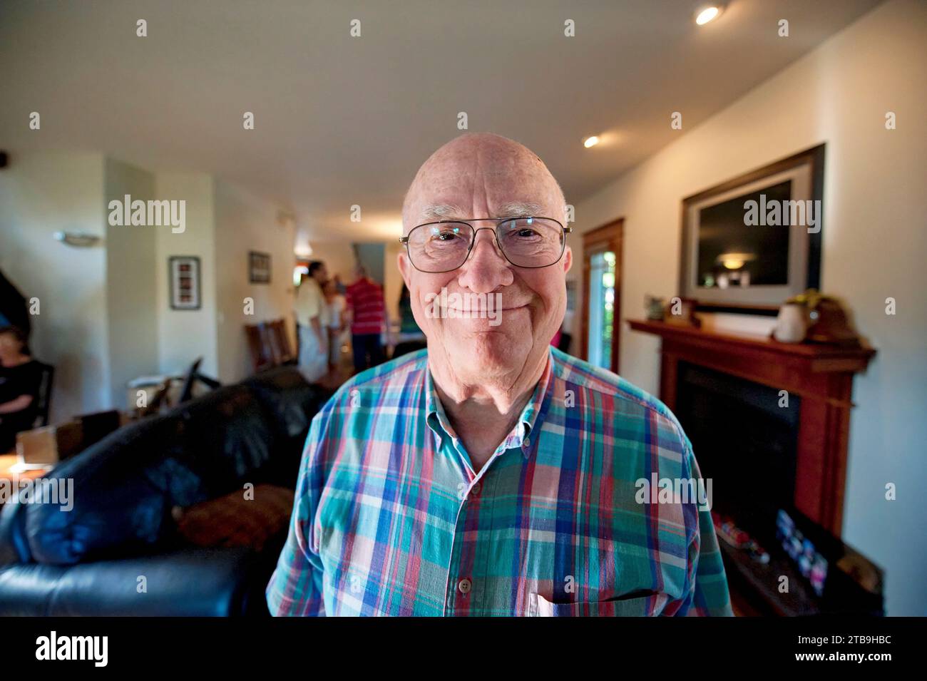 Elderly man smiles big for the camera; Lincoln, Nebraska, United States of America Stock Photo
