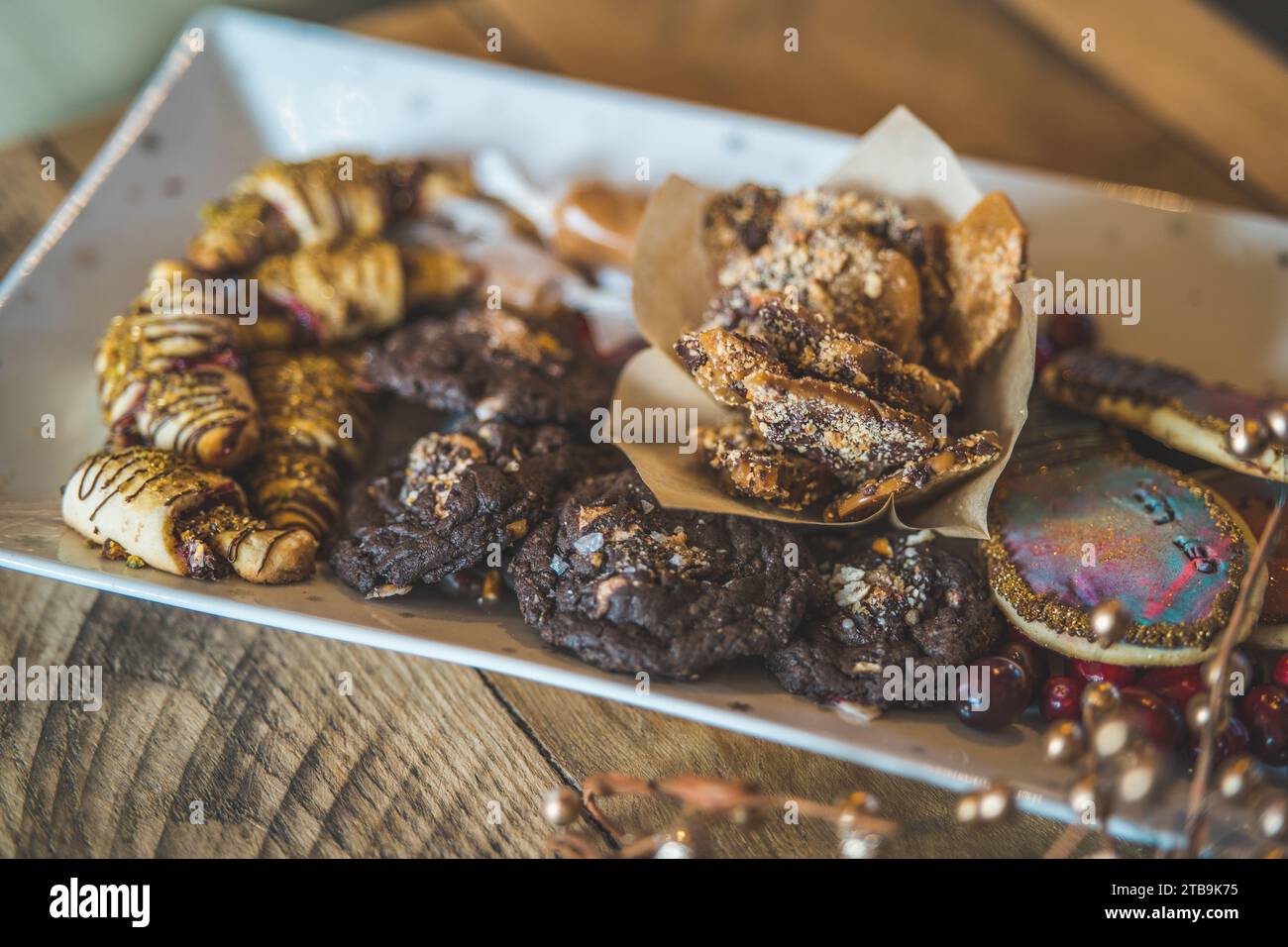 This stock photo features a delectable array of sweet treats presented ...