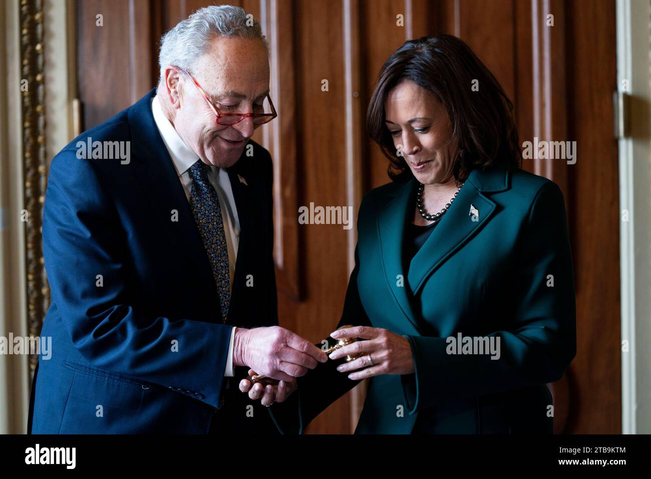 Washington, United States. 05th Dec, 2023. Senate Majority Leader Chuck Schumer, D-NY, presents Vice President Kamala Harris with a golden gavel after casting her 32nd tie-breaking vote, the most ever cast by a Vice President, in the Senate at the U.S. Capitol in Washington, DC on Tuesday, December 5, 2023. Photo by Bonnie Cash/UPI Credit: UPI/Alamy Live News Stock Photo