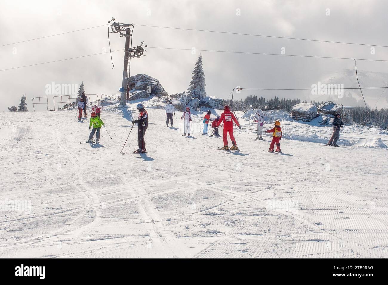 Kopaonik, Serbia - January 22, 2016: Ski resort Kopaonik, Serbia, ski lift, ski slope, people skiing down from the drug lift Stock Photo