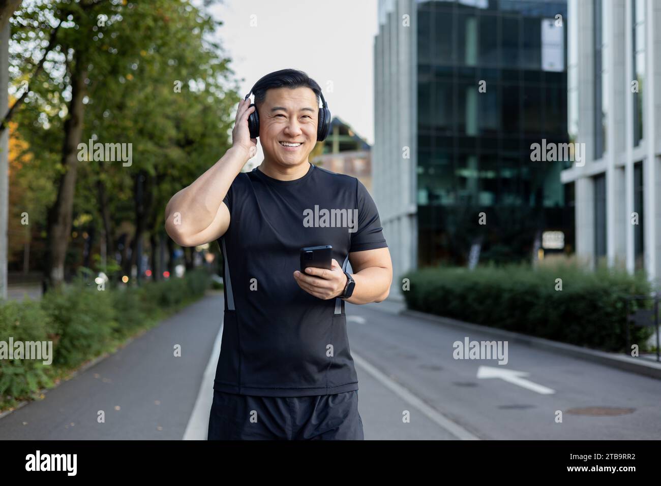 Muscular asian male model in hi-res stock photography and images