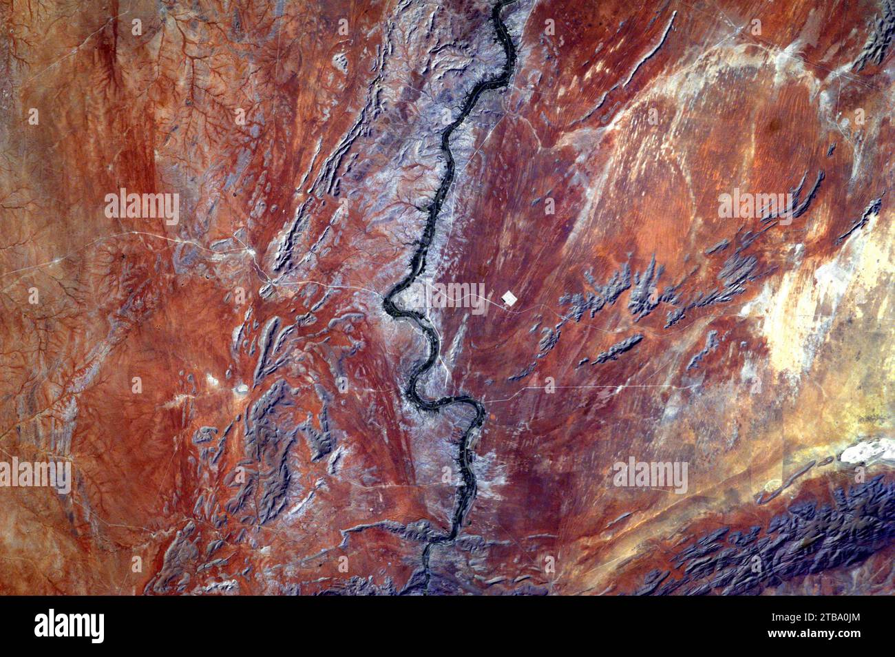 View from space of sand dunes, ancient rocks and the Orange River in the Kalahari Desert, Africa. Stock Photo