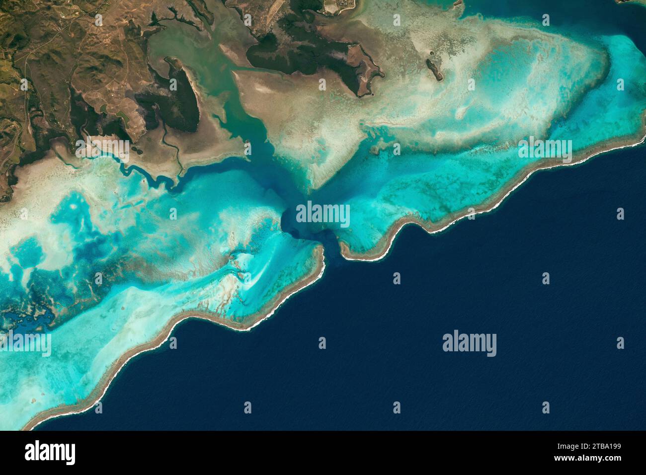 View from space of the fringing coral reef on the south coast of New Caledonia. Stock Photo