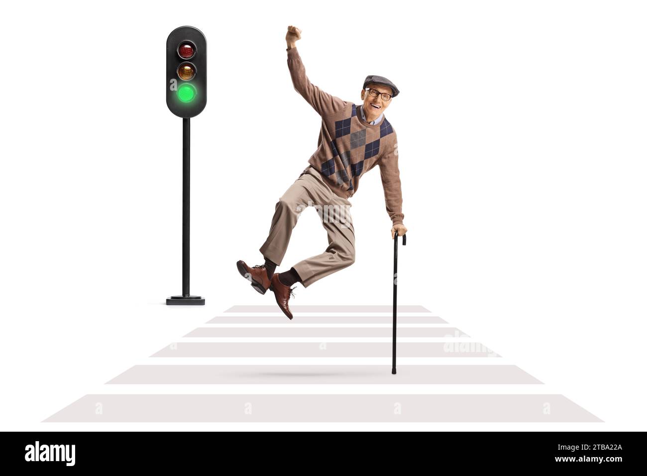 Happy elderly man leaning on a walking cane and jumping at a pedestrian