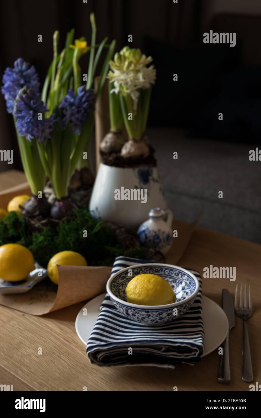 Spring table setting with flowers Stock Photo