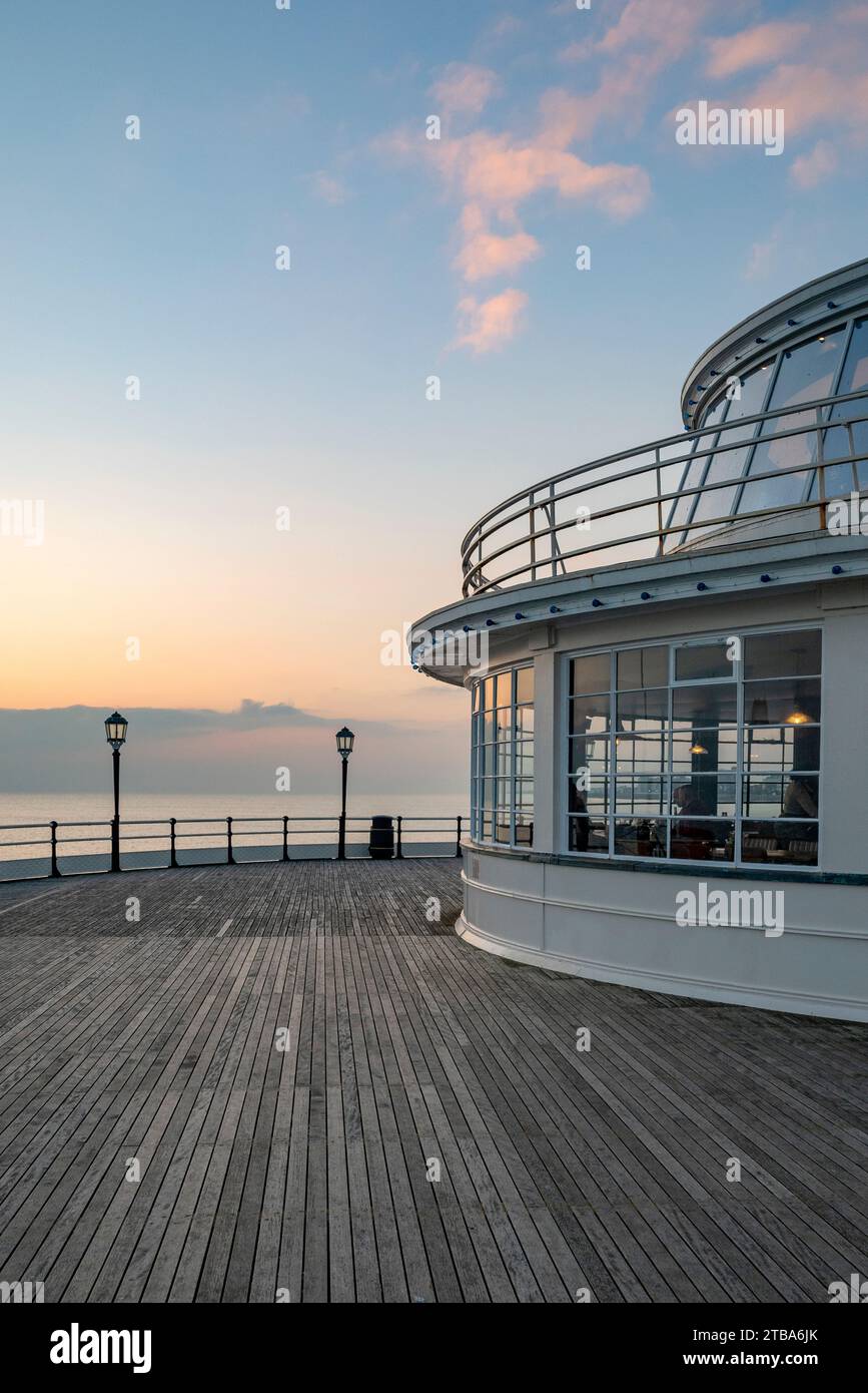 The southern end of Worthing Pier at dusk on the south coast of England