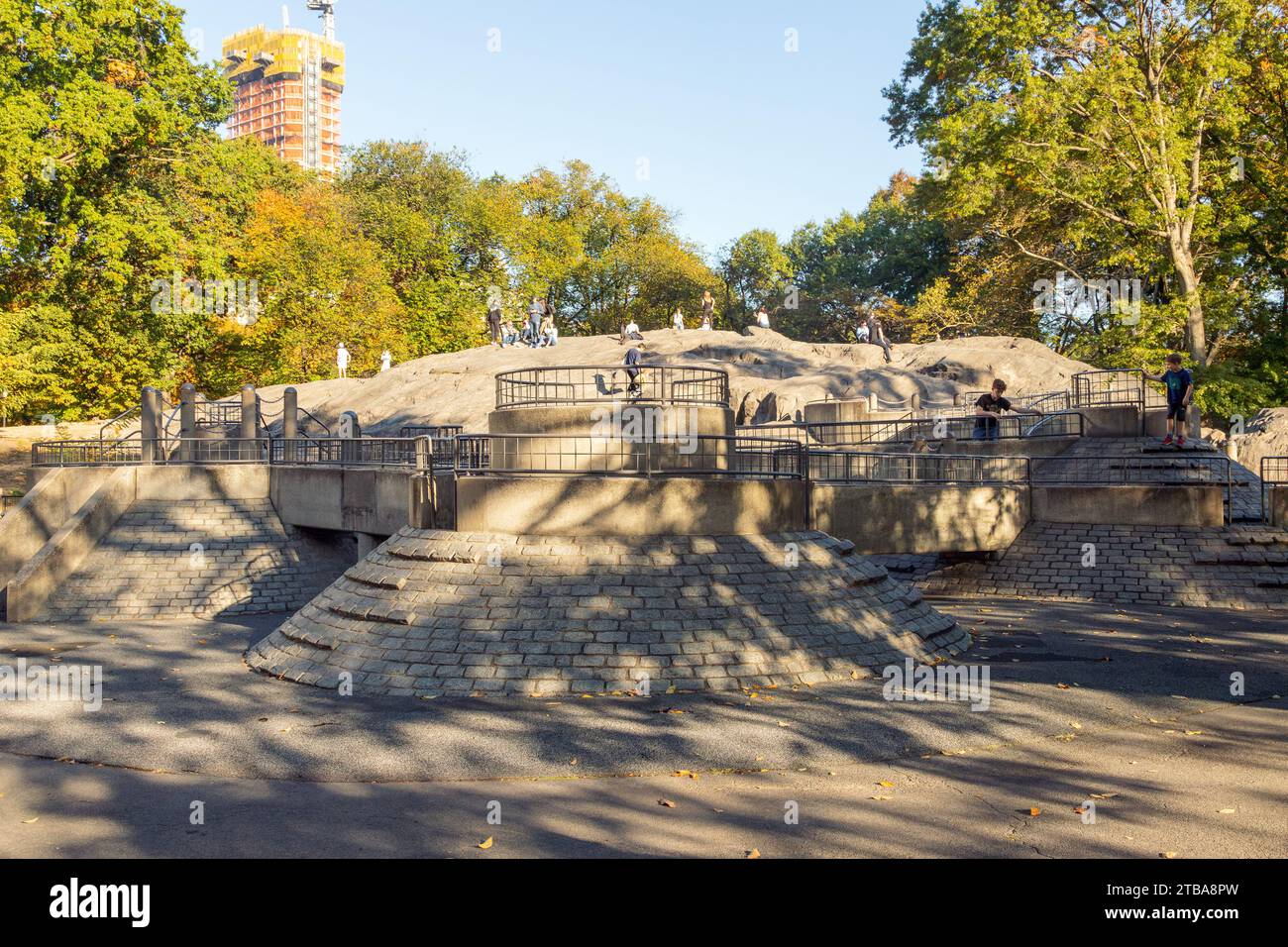Umpire Rock and the Hecksher Playground, Central park in Fall, New York City, United States of America. Stock Photo