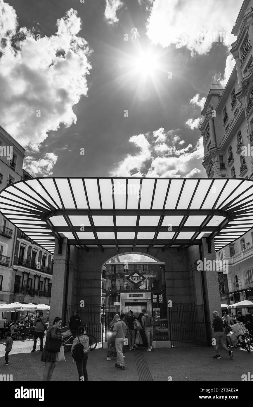 People walking by the Gran Via metro station, Madrid, Spain Stock Photo